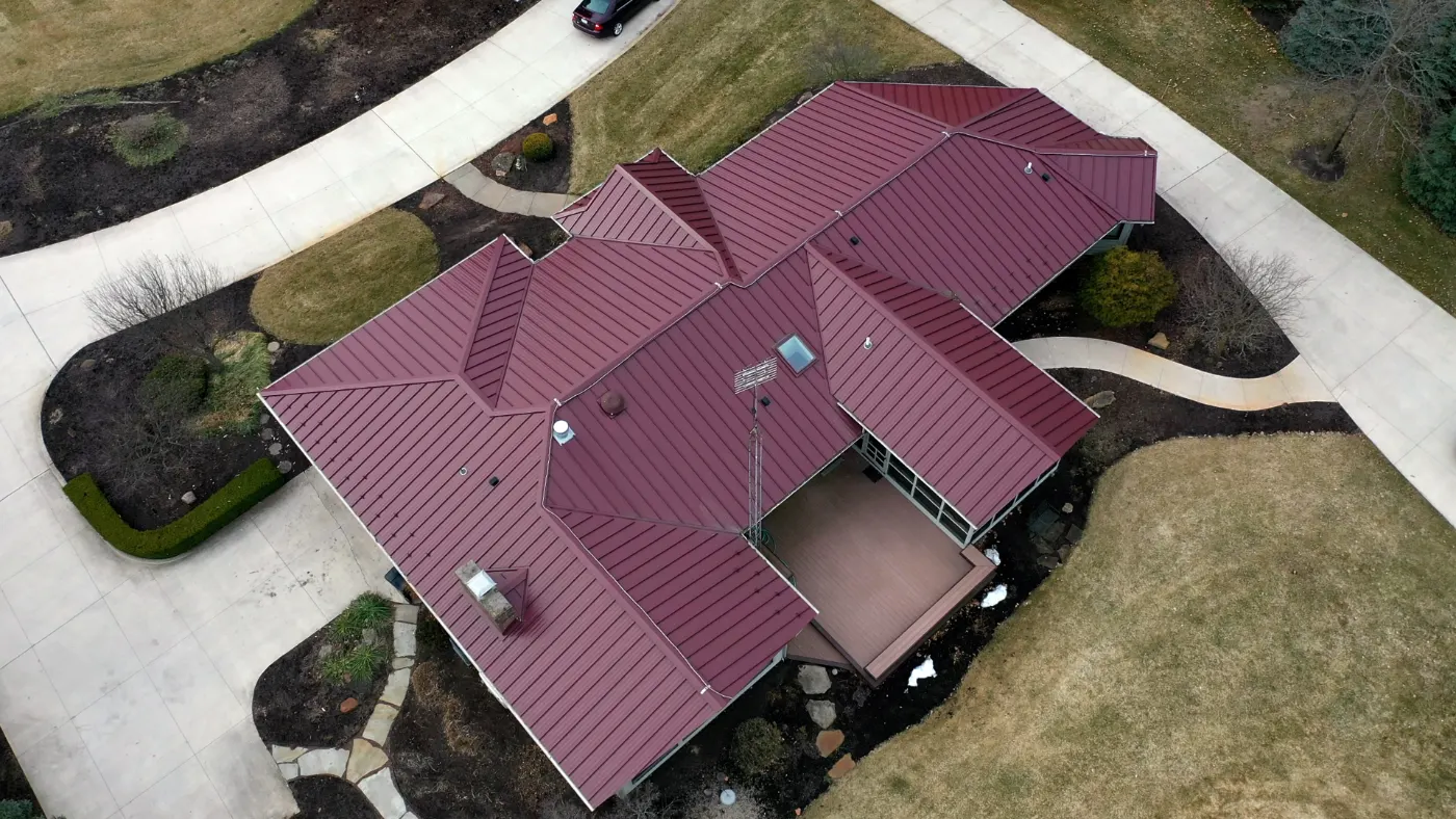 Tarping and dry-in on a Holliday Farms commercial roof